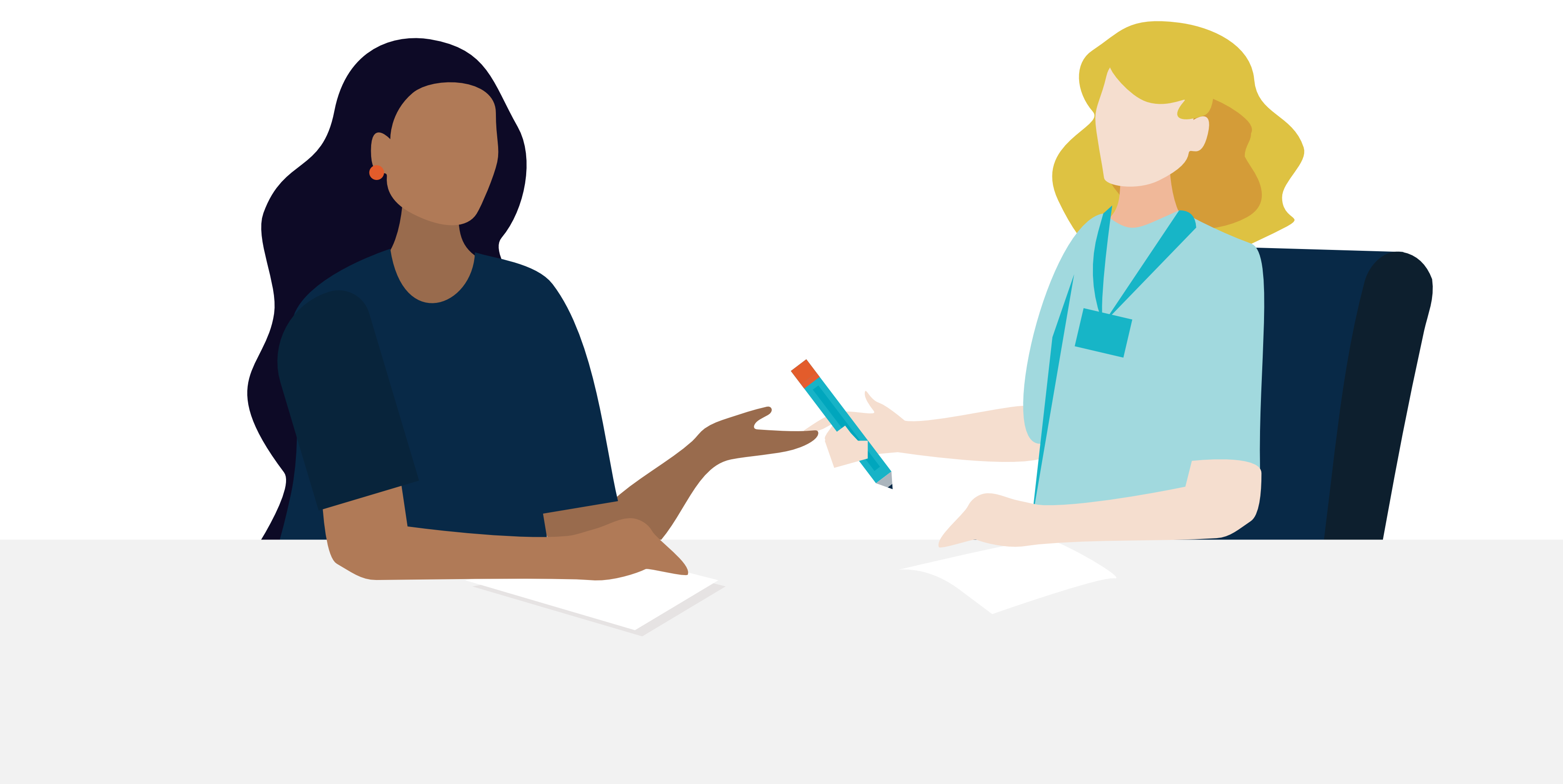 Two women in a 1:1 meeting